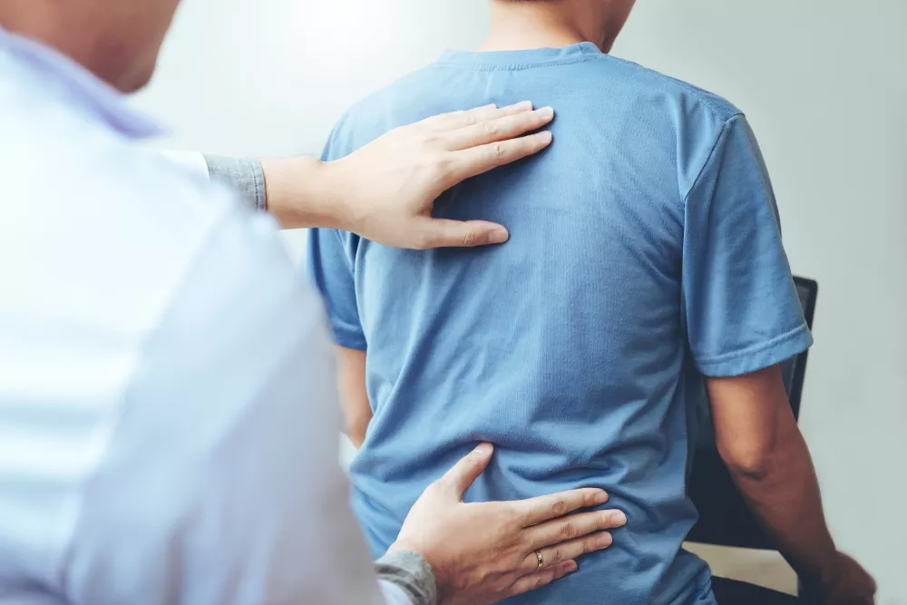 Chiropractor treating a patient