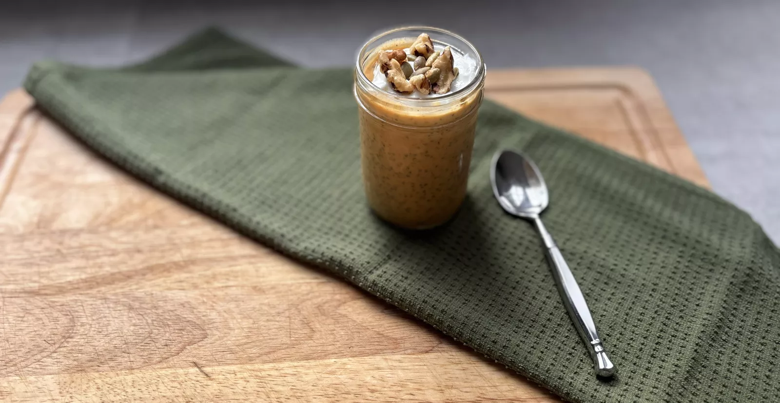 Jar of chia pudding with spoon