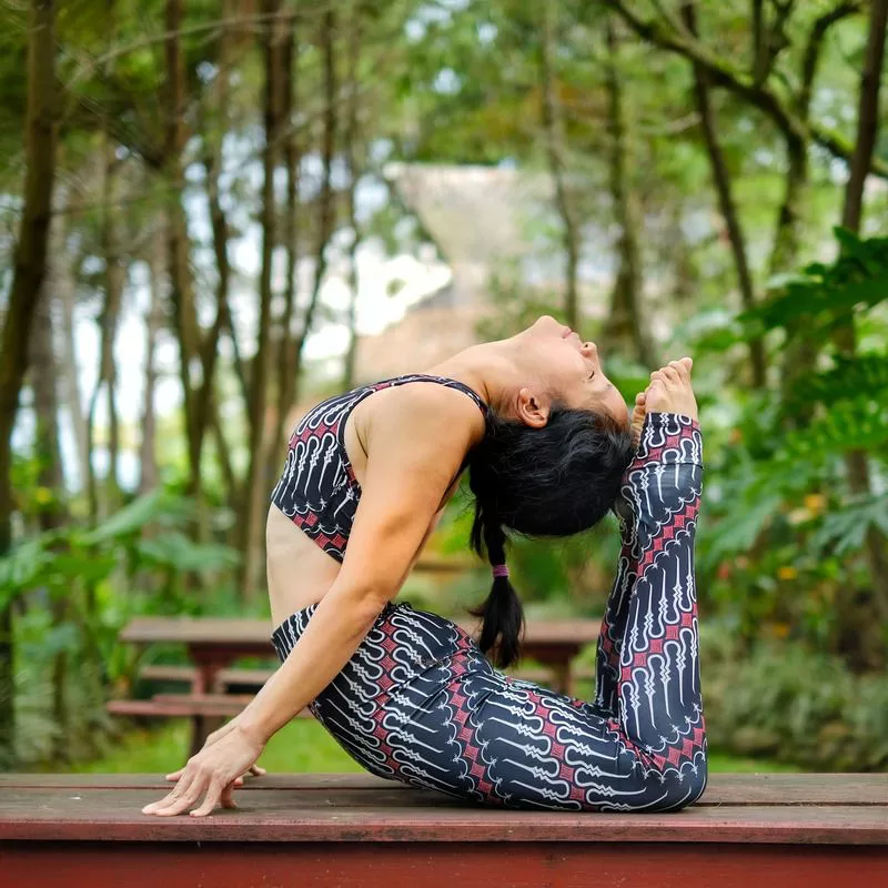 Woman doing yoga in the park